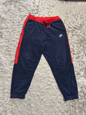 Nike fleece pants in good condition, size L, blue and red