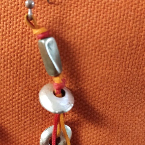 Hippie earrings made of steel with silk cord like new
