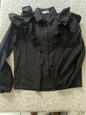 Women's shirt with ruffles black like new, missing one button
