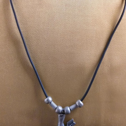 Short necklace used with hand holding arrow pendant in white metal