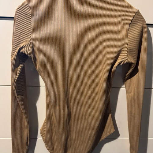 Ckontova beige bodysuit size S like new with chest opening