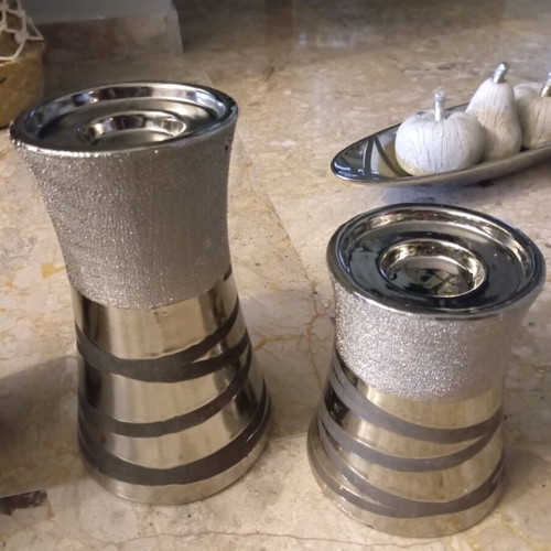 Set of vases with decorative items used