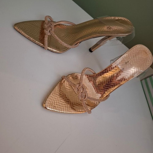 Pumps new, size 39, black and gold