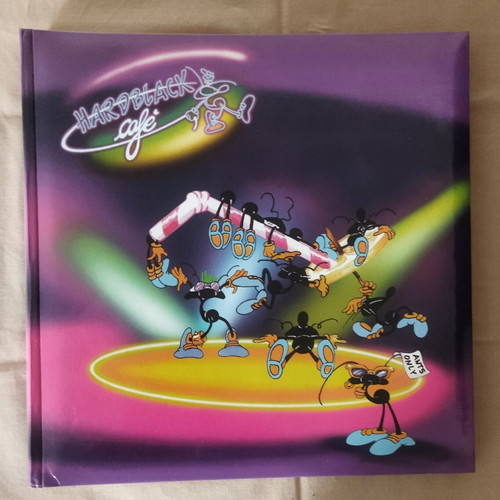 Children's photo album with hard pages and interleaved tissue paper