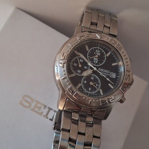 Seiko Quartz Japan Chronograph Alarm watch used, blue dial, silver bracelet