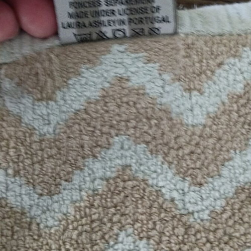 Laura Ashley face towel like new with geometric pattern light blue beige