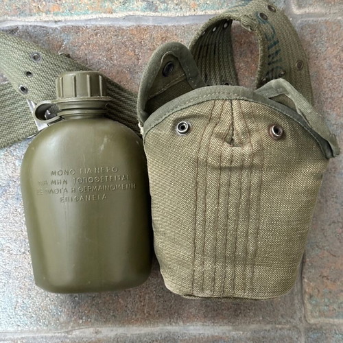 Military plastic canteen with case and belt used