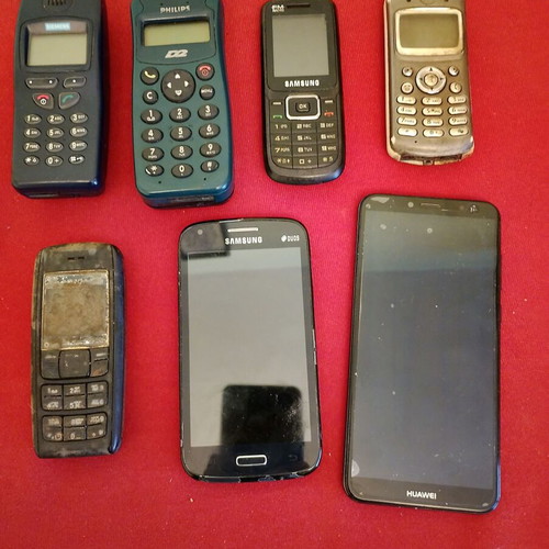 Smartphones and old phones used with chargers