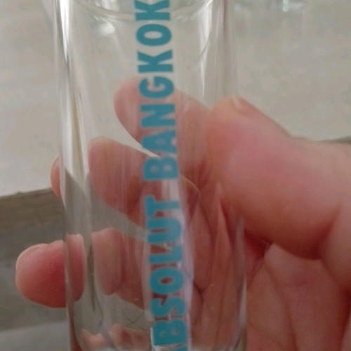 Collectible Absolut shot glasses with city names, like new