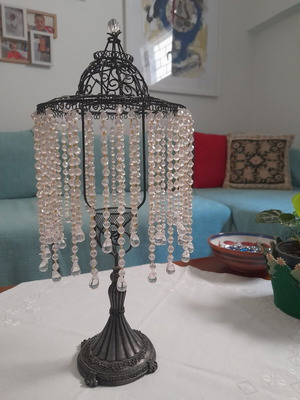 Vintage metal candlestick with transparent beads