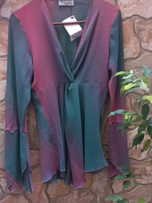 Shirt new with front opening ideal for M-L sizes
