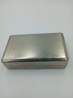 Metal rolling cigarette case used