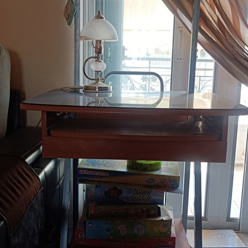 Compact computer desk with glass surface and wheels like new