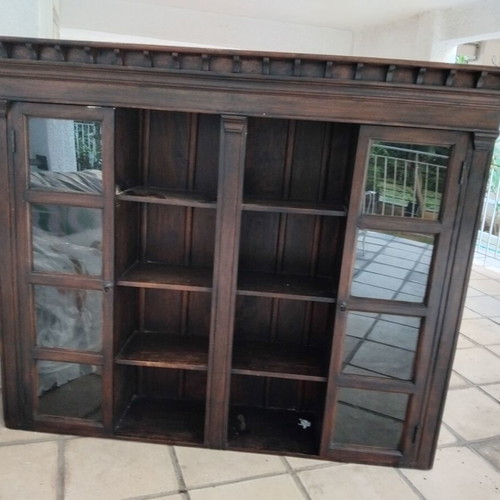 Two-piece walnut wood furniture unit with glass shelves