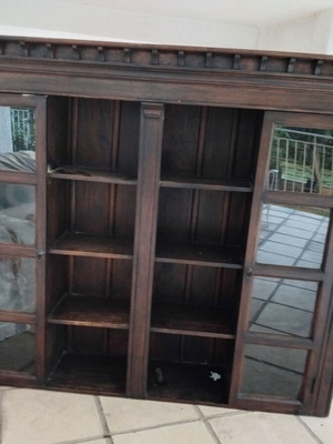 Two-piece walnut wood furniture unit with glass shelves
