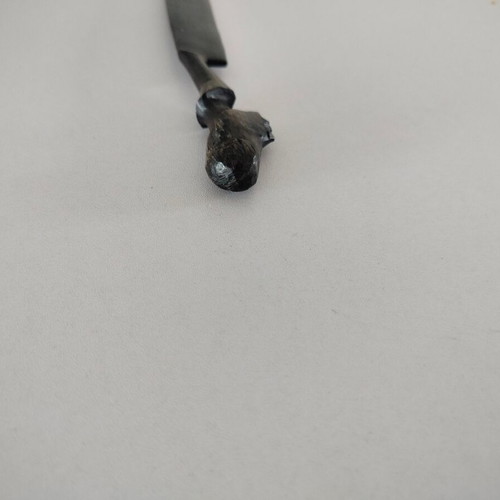 Ebony wood paper cutter used