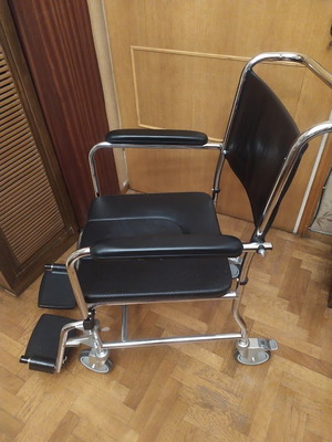 Wheelchair with toilet opening, like new condition