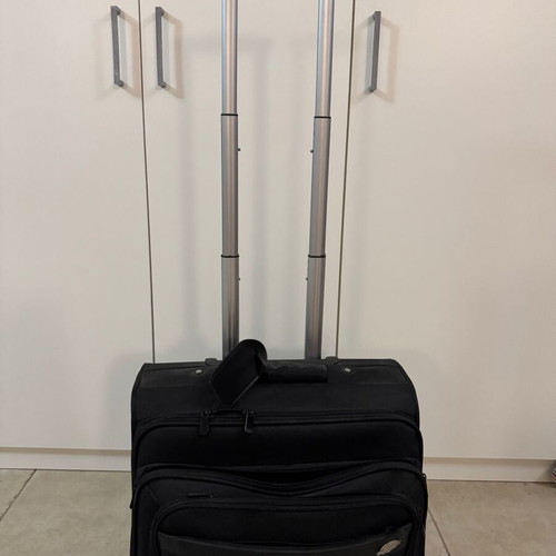 Laptop black fabric cabin travel suitcase like new with 4 wheels