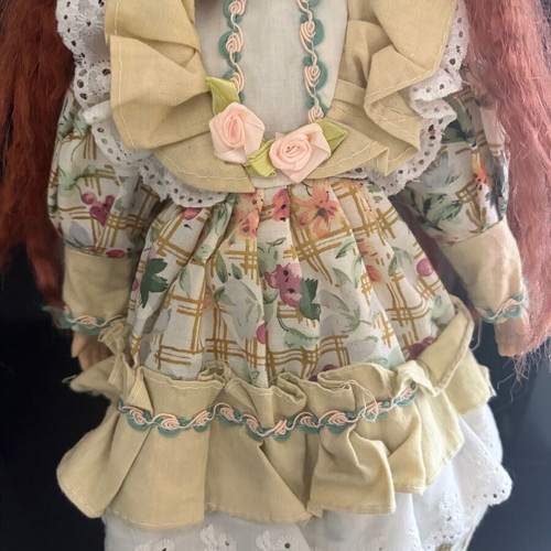 Porcelain doll like new with ginger hair