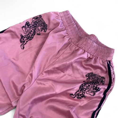 Pink sweatpants with black tiger graphic