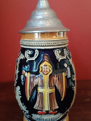 Ceramic beer stein from Germany like new with metal lid