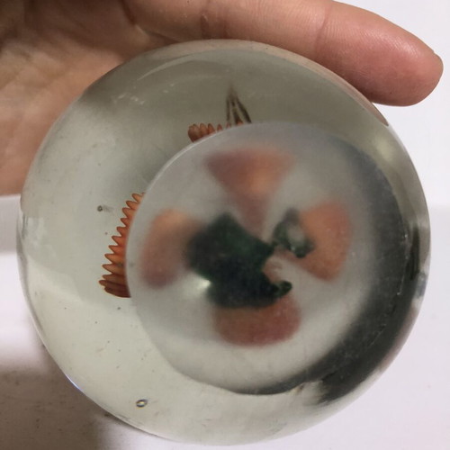 Handblown glass dome paperweight with stylized bees