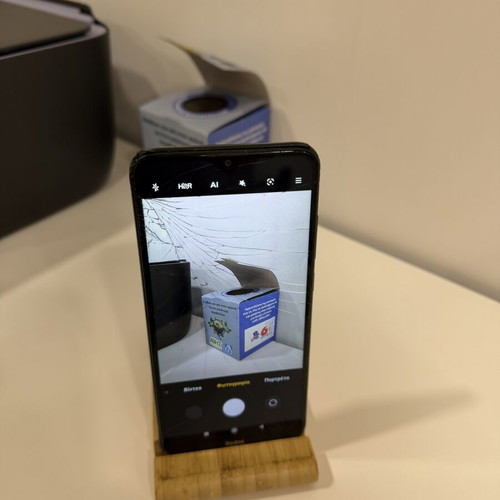 Xiaomi Redmi 8 smartphone used with cracked screen and damages
