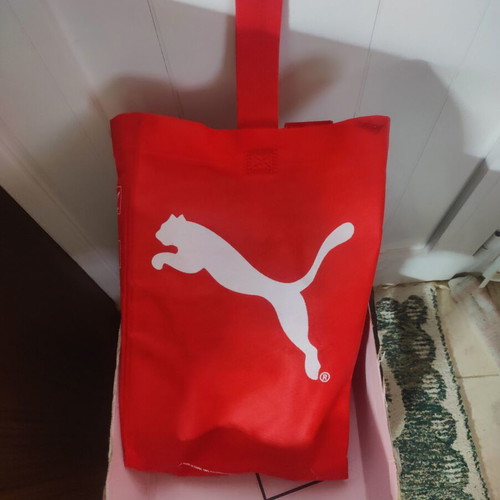 Puma men's black and red boots used with original carry bag