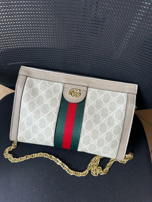 Gucci clutch bag crossbody like new with beige chain