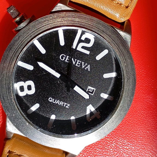 Geneva wristwatch battery powered used, large size