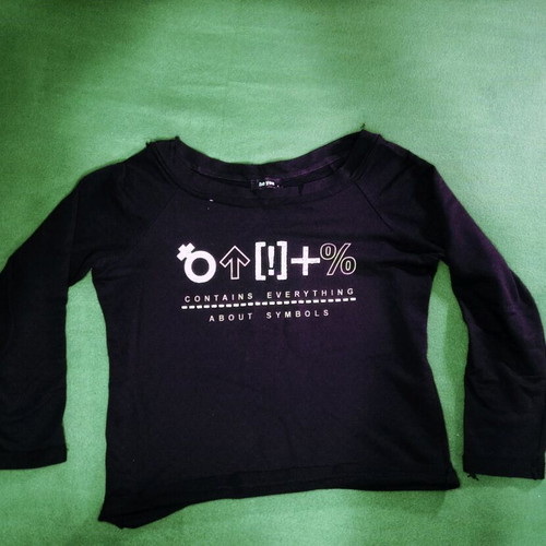 Be You black blouse used with graphic print and symbols