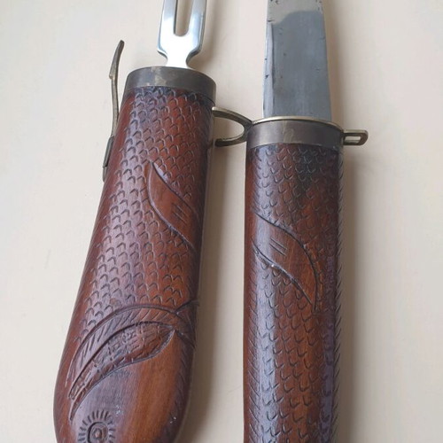 Vintage barbecue set used with knife and fork in wooden sheath
