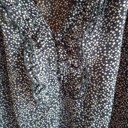 Blue polka dot chiffon blouse with ruffles and smocked waist, like new