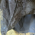Short-sleeve blouse with transparency and sequins