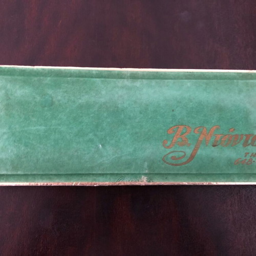 Old box used with B. Ntondos logo made of paper and velvet