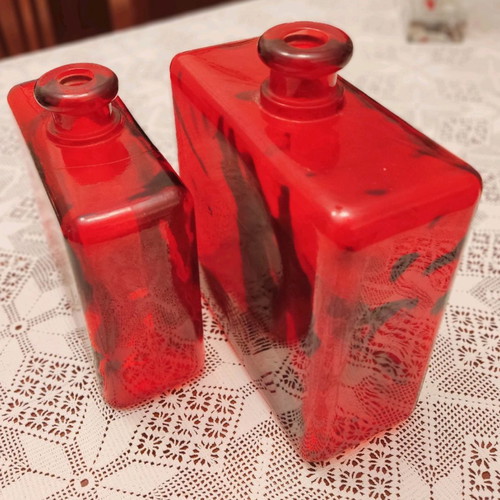 Set of two used decorative red glass vases made in Spain