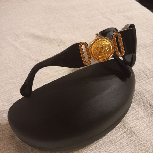 Versace sunglasses like new, vintage with gold decor