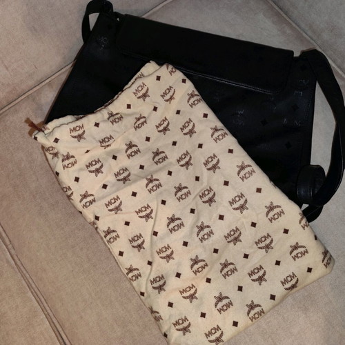 MCM shoulder bag used, black, with multiple compartments