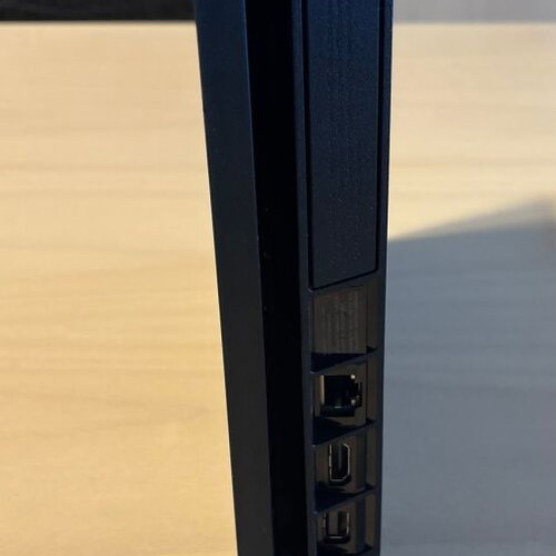 PS4 Slim 500GB console with 2 DualShock 4 controllers and Chimparty game