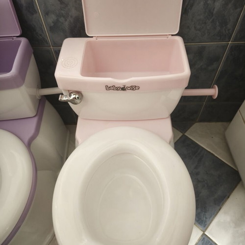 Babywise yoyo potty with flush sound and toilet paper holder, pink and purple