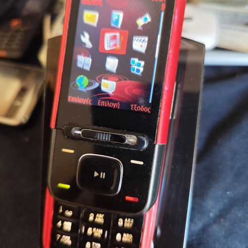 Nokia 5610 XpressMusic phone used with charger