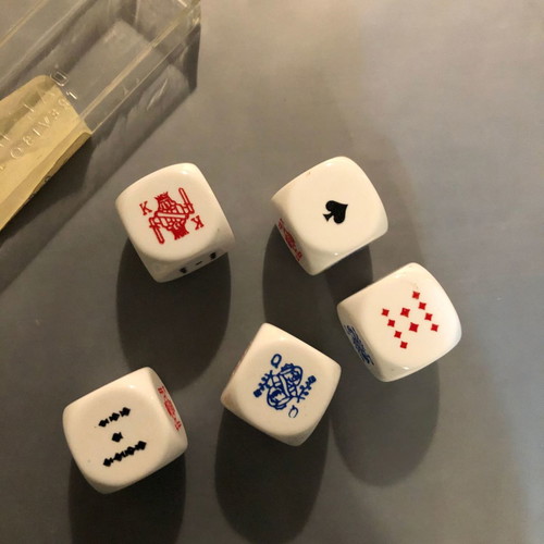 Dice set with playing card symbols used, with box