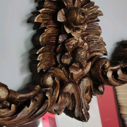 Very old carved wooden mirror like new
