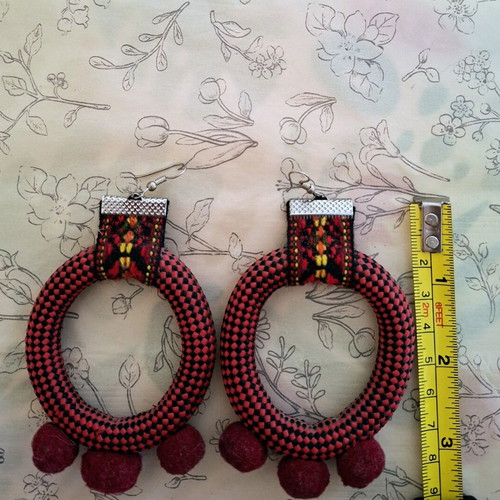 The Curious Cat statement ethnic earrings with fabric and burgundy pom-poms