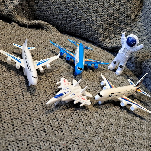 Plastic airplane set, spaceship and astronaut used