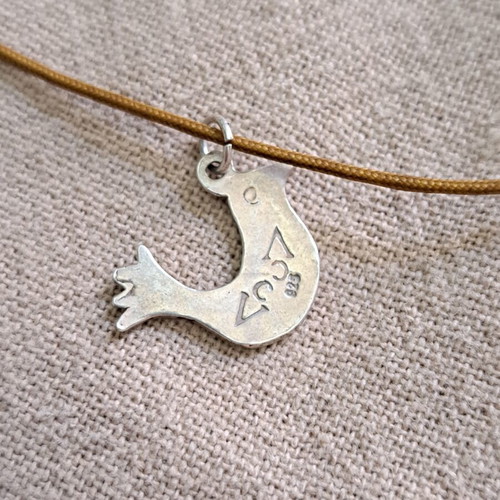 Vally Kontidis Silver Bird Necklace on Ecru Cord like new