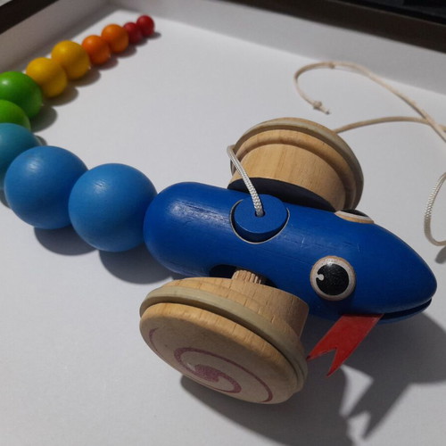 PlanToys wooden pull-along snake like new for 12+ months
