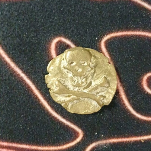 Pirate coin used, painted with gold color