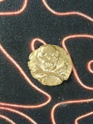 Pirate coin used, painted with gold color