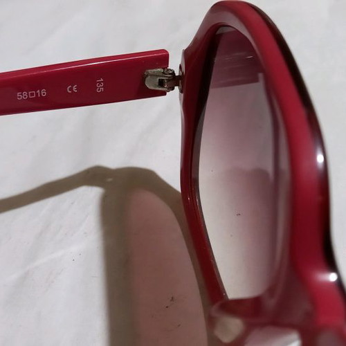 Calvin Klein sunglasses used, red frame with brown gradient lenses